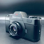 EXC+3 Pentax Auto 110 Super Film Camera W/20-40MM F/2.8 LENS&AF-130P Flash Jp. Fixed Price $179.99.