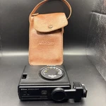 Nikon Speedlight SB-10 Shoe Mount Flash Untested With Leather Case. Fixed Price $22.00.
