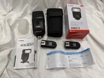 Canon 430EX Ii Flash + Shoe 2 Wireless Diffuser. Fixed Price $50.00.
