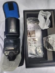Neewer Z2PRO-C 2.4G Ttl Round Head Flash Speedlite Compatible With Canon. Fixed Price $69.99.