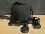 Canon T60 Camera With Bag, Suntax Phototechnics 9000A, Lens, Star Hoya. Fixed Price $170.00.