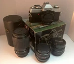 Vintage Minolta Xg 1 35MM Slr Film Camera Body Lenses Flash Case Strap. Fixed Price $135.00.