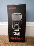 Neewer TT560 Speedlite Flash, Bounce, Swivel, Zoom, GN38. Fixed Price $32.00.