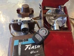 Canon Ep 35MM Vintage Rangefinder Camera With 50MM F/1.8 Lens Plus B1 Flash Unit. Fixed Price $400.00.
