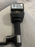 Sunpak Auto 555 Handle Mount . Only Body Flash, No Batteries. Fixed Price $200.00.