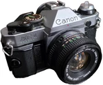 Canon AE-1 Program 35MM Slr W/50MM 1.8 Lens Flash & Lots Of Extras. Fixed Price $199.99.