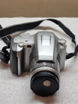 Olympus IS-50 28-120MM All-in-one Slr Camera W/ Promaster 52MM Uv Filter.... Fixed Price $39.95.
