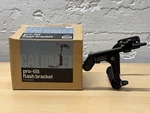 Upp Outlet Item Calumet MF6712 Pro-tilt Flash Bracket Right Handed (AH08). Fixed Price $25.00.