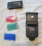 Achiever 821TZ Auto Thyristor Flash, Shoe Mount Includes Filters Good Condition. Fixed Price $15.00.
