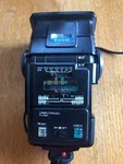 Rokinon Computerized Flash Unit With Adjustable Zoom For Cameras. Fixed Price $9.94.