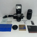 Olympus OM-10 35MM Slr Film Camera, 50MM, 70-210 Lenses, Flash + More. Fixed Price $99.99.