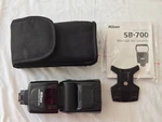 Original Nikon SB-700 Speedlight Flash W/AS-19 And Spanish Manual, Case. Fixed Price $95.95.