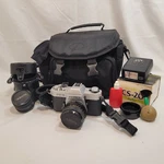 Yashica FX-2 W/ 28MM 50MM Lens CS-20 Flash Case And Vivitar 2X24 Teleconverter. Fixed Price $124.89.