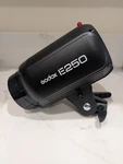 Godox E250 Strobe Flash Lighting Lamp And At Series Studio Trigger. Fixed Price $109.00.