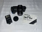 OM77AF 35MM Autofocus Slr Film Camera With Manual (olympus OM-707). Fixed Price $25.00.