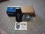 New Promatic TCK-4900 Auto Thyristor Electronic Flash Mounted Shoe Camera Asa 25. Fixed Price $34.99.