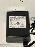 Genuine QB-40 Charger For Quantum Turbo Battery DV-1250 Untested. Fixed Price $15.95.