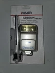 Nib Nissin Digislave Version 1.5 Flash For Cameras With Mounting Plate. Fixed Price $20.00.