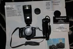Canon Camera Eos 650D Film W/35MM-135MM Lens Flash Handle QTB9500A. Fixed Price $359.99.
