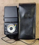 Minolta Auto 320 Flash W/ Leather Case Tested And Working. Fixed Price $25.00.