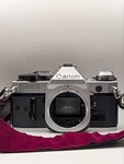 Canon AE-1 Program 35MM Slr Film Camera Body + Speedlite 166A Flash & Manuals. Fixed Price $144.00.