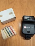 Dejur Electra N-260 Auto Flash Adjustable W/ Filters. Fixed Price $25.00.