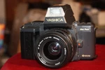 Vintage Yashica 230AF 35MM Camera : 35-70MM Lens And Dedicated Flash. Fixed Price $69.00.