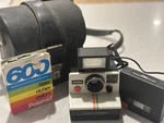 Polaroid Onestep SX-70 Rainbow Instant Camera W/ Flash Case & 600 Film Box. Fixed Price $45.00.