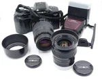 Minolta Dynax 7XI 35MM Slr Kit, Two Zoom Lenses, Dedicated Flash. Fixed Price $120.00.
