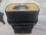 Metz Sca 32Z-2 Flash Works Has Black Spot On Lens 3000/ Parts Repair. Fixed Price $10.99.