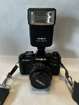 Minolta X-700 Slr Camera Bundle With Flash And 2 Additional Lenses. Fixed Price $250.00.
