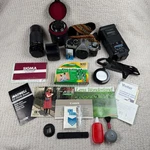 Canon AE-1 Program 35MM Film Camera Bundle Vintage Lenses Flash Accessories. Fixed Price $199.99.