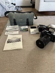 Minolta Maxxum 7000 Slr Camera With Sigma Zoom Lens & 1800AF Flash Tested. Fixed Price $80.00.