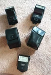 Lot Of 3 Camera Hot Shoe Mount Flashes UNTESTED-2 Have Case. Fixed Price $10.25.