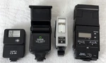 Lot Of Four (4) Mixed Camera Flashes - Untested For Parts. Fixed Price $15.00.