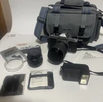 Pentax K1000 35MM Film Camera Kit - 2 Lens, Flash, Bag, Manuals. Fixed Price $179.99.