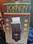 Rokinon D980AFZ-C Digital Ttl Power Zoom Flash For Canon (black). Fixed Price $23.99.