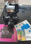 X-7A Minolta 52MM Vintage Film Camera With Star Sdef 180 Flash. Fixed Price $50.00.