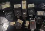Huge Lot Of Vintage Flash/cables. Is/untested. Fixed Price $100.00.