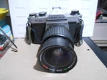 Pentax K1000 35MM Slr Film Camera W Tou/five Star Auto Zoom Macro Lens. Fixed Price $120.00.