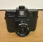 Holga 120CFN Film Camera With Built-in Flash 60MM Lens. Fixed Price $49.99.