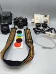 Minolta X-700 Slr 35MM Film Camera W/ Md 50MM 1.7 Lens And Flash. Fixed Price $180.00.