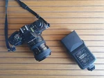 Minolta X-700 35MM Film Camera With Tokina Sz-x 35-70MM F3.5-4.6 And Flash. Fixed Price $300.00.