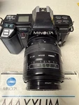 Minolta Maxxum 7000 Af Camera W/ 2 Sigma Lenses, Flash, Manuals. Tested! See Pic. Fixed Price $76.00.