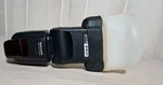 Neewer Speedlight Nw 565EX Flash For Canon Cameras With Diffuser. Fixed Price $34.00.