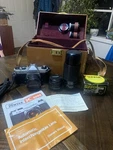 Asahi Pentax K1000 Camera With Accessories And Extra Lens W/ Polaroid Case. Fixed Price $169.00.