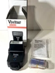 Vivitar 2800 Auto Thyristor Shoe Mount Electronic Flash W/ Color Filters. Fixed Price $12.50.
