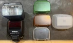 Nikon SB-5000 Speedlight With Filters, Diffuser, Adapters, Lens Hood And Case. Fixed Price $300.00.