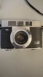 Kodak Automatic 35MM Film Camera Silver And Black W/ Strap. Fixed Price $15.00.