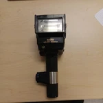 Sunpak Auto 555 Handle Mount Flash W/ - Untested. Fixed Price $27.00.